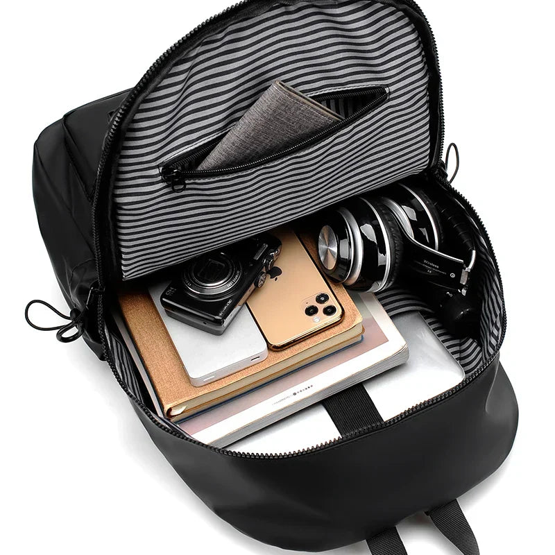 1Pcs 14-inch Fashion Casual Backpack, Spacious Laptop Compartment,Waterproof Fabric,Ideal for Men, Students, and Professionals
