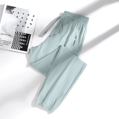 New High Quality Ice Silk Men's Women's Pants Summer Thin Loose Quick Drying Breathable Sports Straight Leg Tie Casual Pants