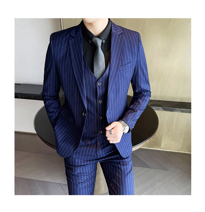 New three-piece suit with tailored striped business suit blazer and trousers set. Korean fashion trend. Stylish wedding attire.