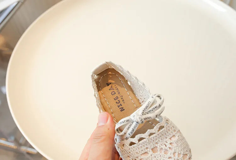 Children's Baotou Sandals Spring Summer New Princess Girls' Woven Hollow Soft Bottom Anti slip Sneaker Bowknot Comfortable