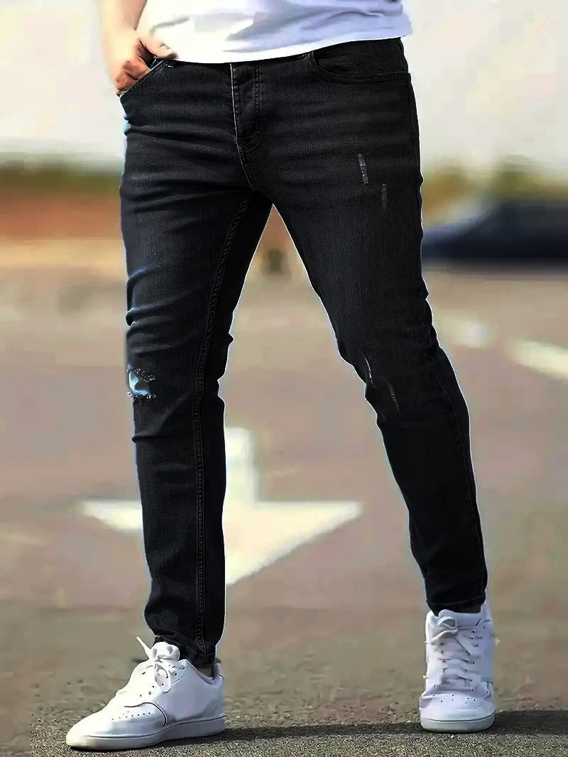 Calça Jeans Masculina Skinny Destroyed Primavera 2026 Lavagem Vintage Elástica Biker com Buracos Casual Ajuste Justo Streetwear Jeans Lápis Jogger