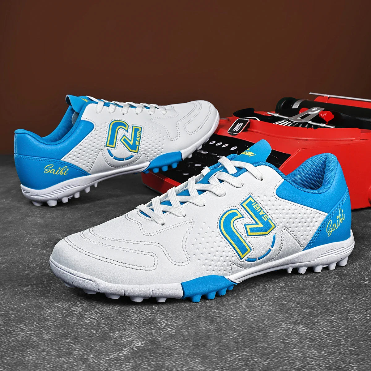 Fashionable sports style professional men's football shoes TF broken nail outdoor sports shoes effectively protect ankles