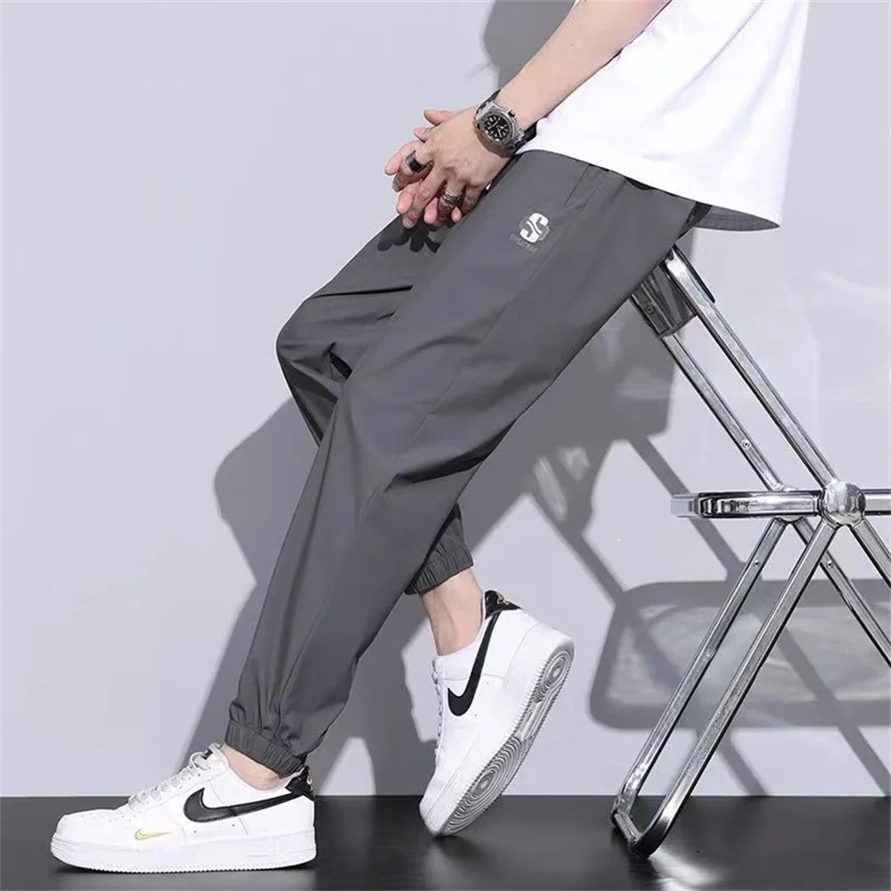 New Ice Silk Pants Men's Fashion Brand Loose Leg Tie Sports Quick Drie 2023 Summer Thin Breathable Cropped Casual Pants