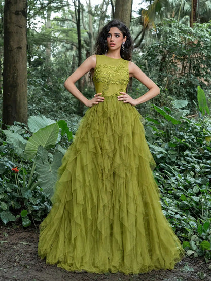 A luxurious party dress for 2026, featuring a round neck, sleeveless design, leaf embroidery, and a multi-layered mesh